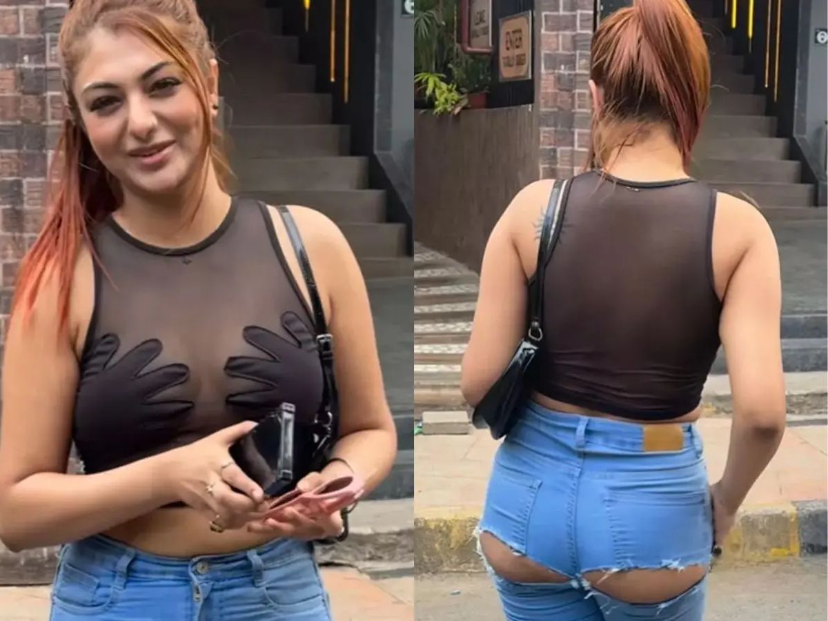 Torn Back Jeans Revealing Top