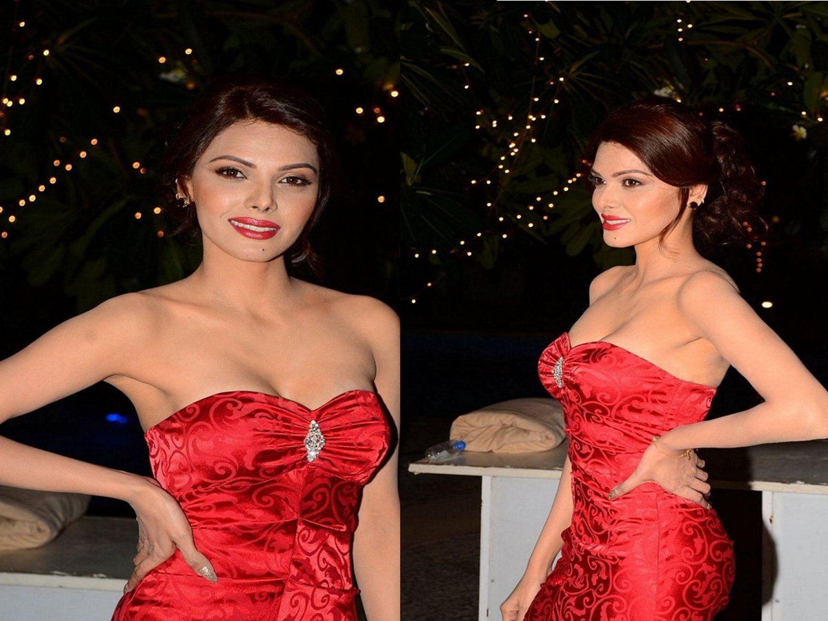 Sherlyn Chopra wearing a bold and sexy red dress