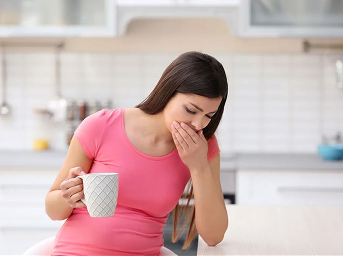 Woman with a confused expression touching her mouth