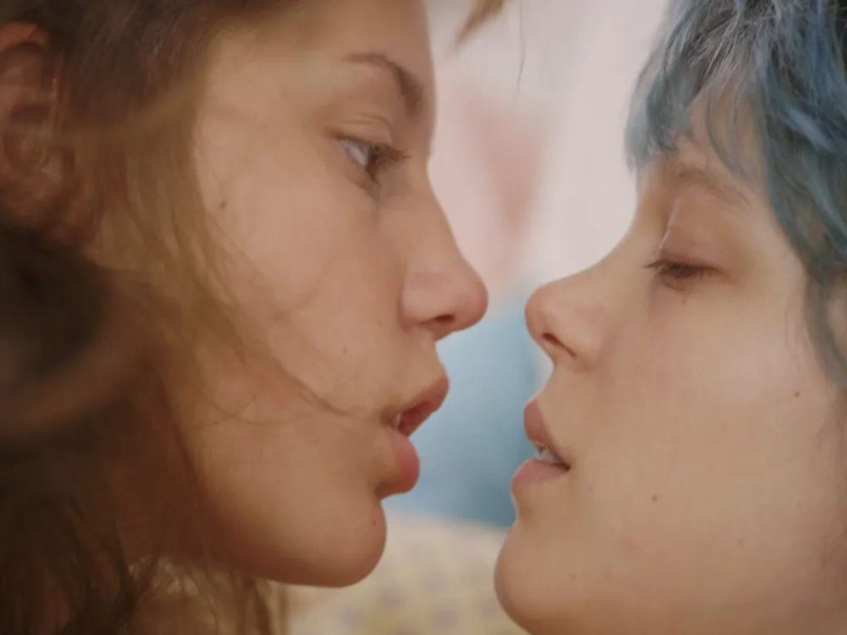 Scene from Blue Is the Warmest Color showcasing the intense connection between the lead characters, highlighting themes of love and sexuality.