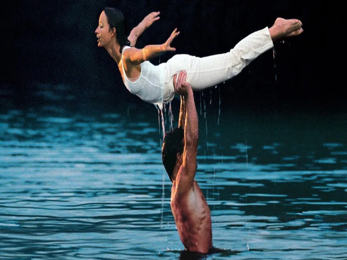 Jennifer Grey and Patrick Swayze dancing closely in Dirty Dancing