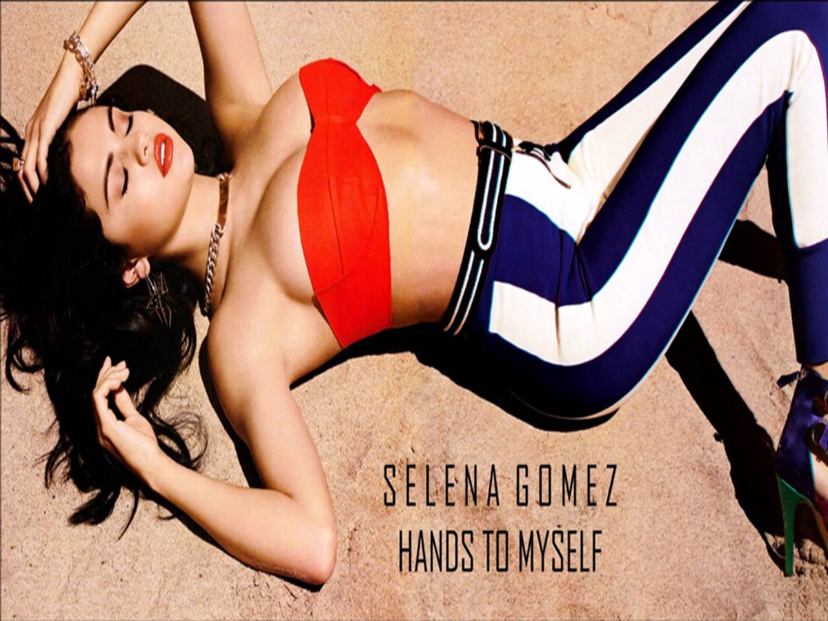 Selena Gomez in black lingerie, immersed in a sultry fantasy scene from the “Hands to Myself” music video