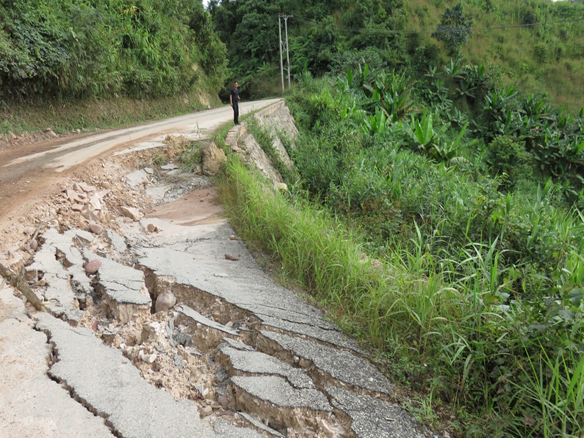Water accumulation on a poorly sloped road causing driving hazards