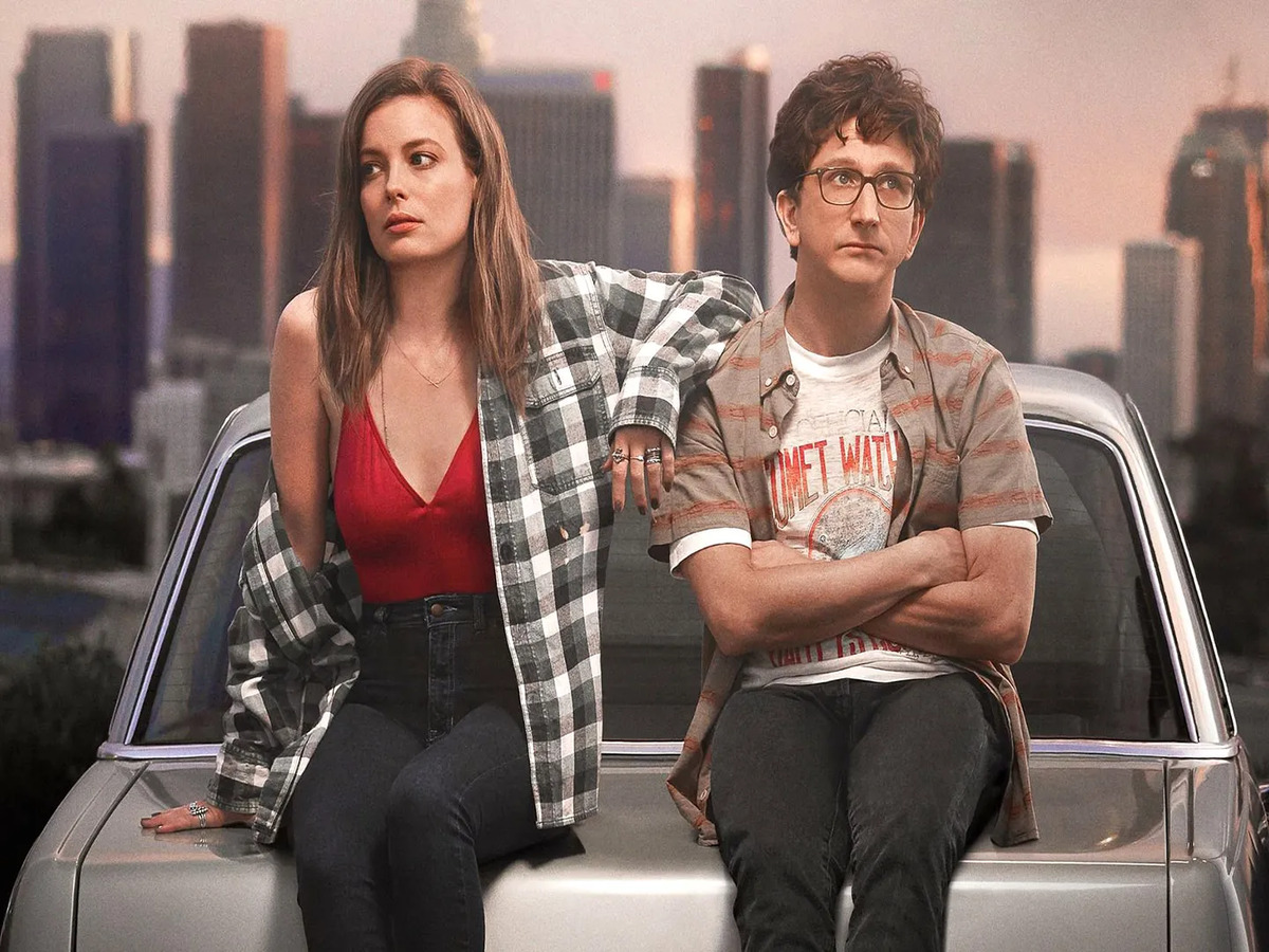 Summer and Ale share a romantic moment in the Italian series "Summertime," highlighting their adventurous connection.