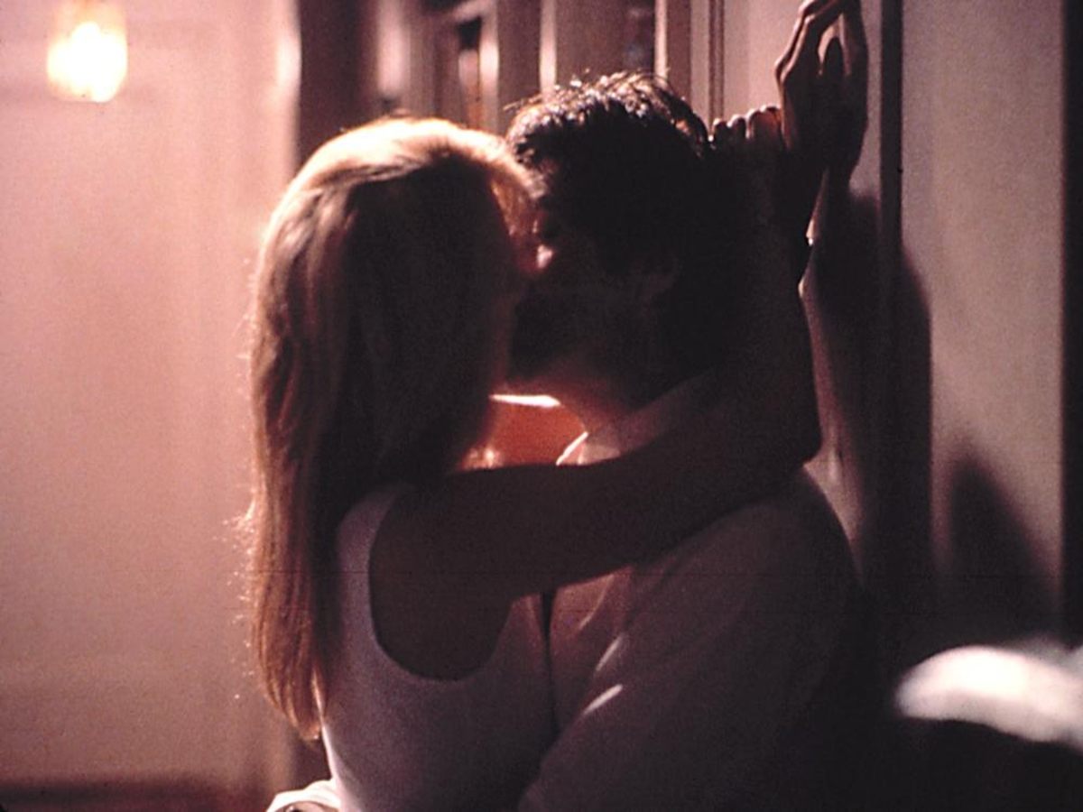 Scene from Sea of Love showcasing Al Pacino as a detective in a neo-noir setting with romantic undertones.