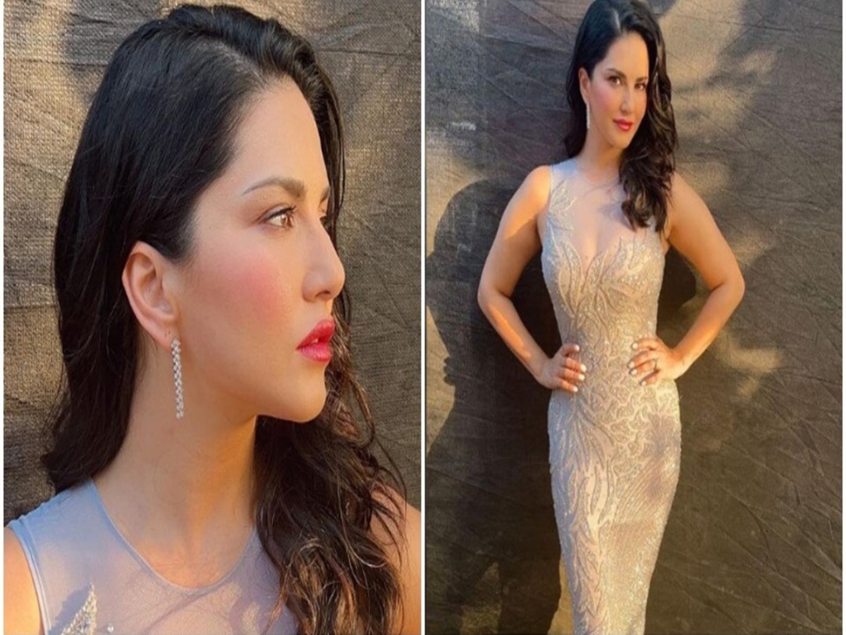 Sunny Leone posing in a stylish outfit at a public event
