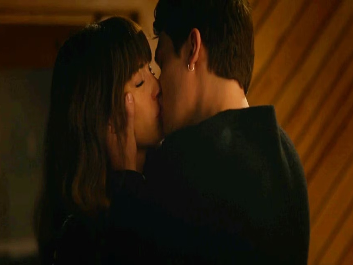 Anne Hathaway and Nicholas Galitzine share a warm, intimate moment from The Idea of You poster