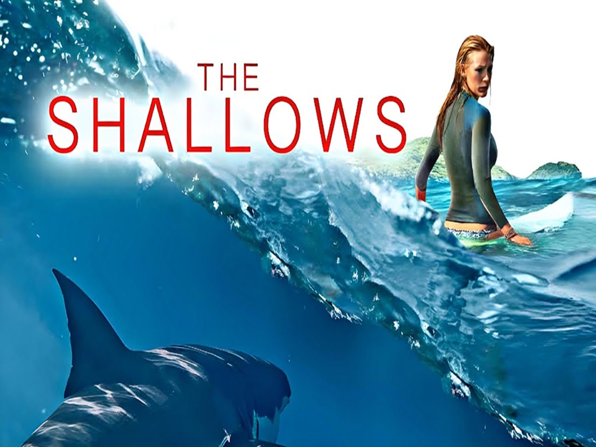 Blake Lively as Nancy, stranded on a rock surrounded by ocean after a shark attack in The Shallows