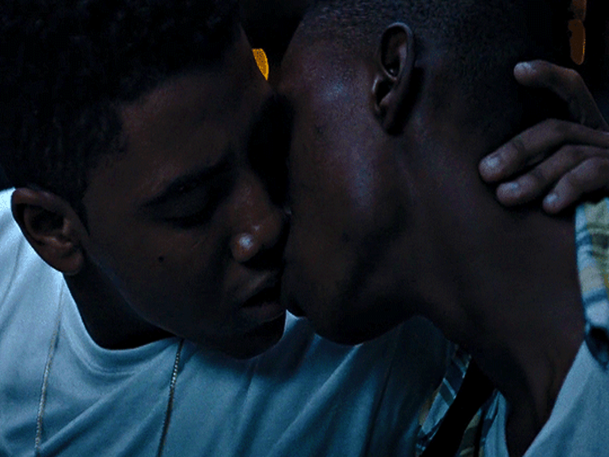 Ashton Sanders and Jharrel Jerome accepting the 'Best Kiss' award at the 2017 MTV Movie & TV Awards, symbolizing love and acceptance for the misfits.