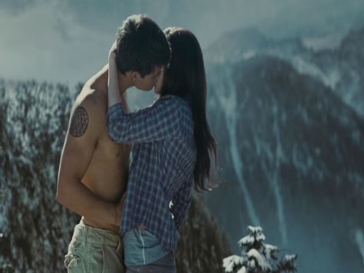 Kristen Stewart as Bella and Robert Pattinson as Edward in a moody pose from Twilight