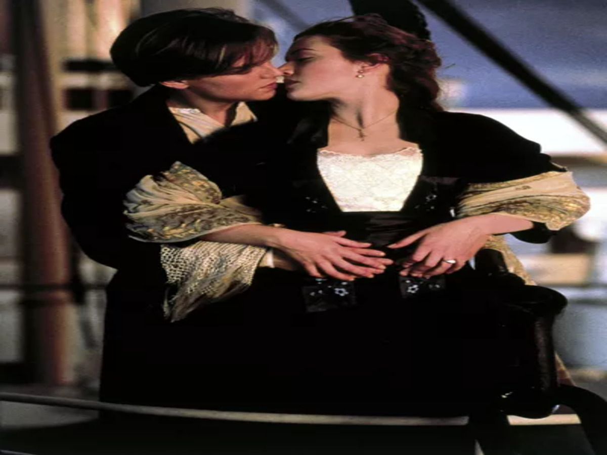 Jack and Rose sharing a romantic moment on the Titanic, embodying the timeless love story depicted in the film.