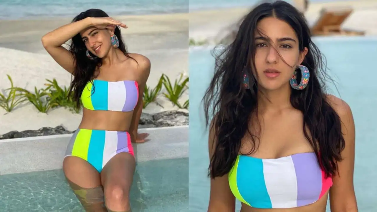 Sara in a colorful tie-dye bikini by the pool