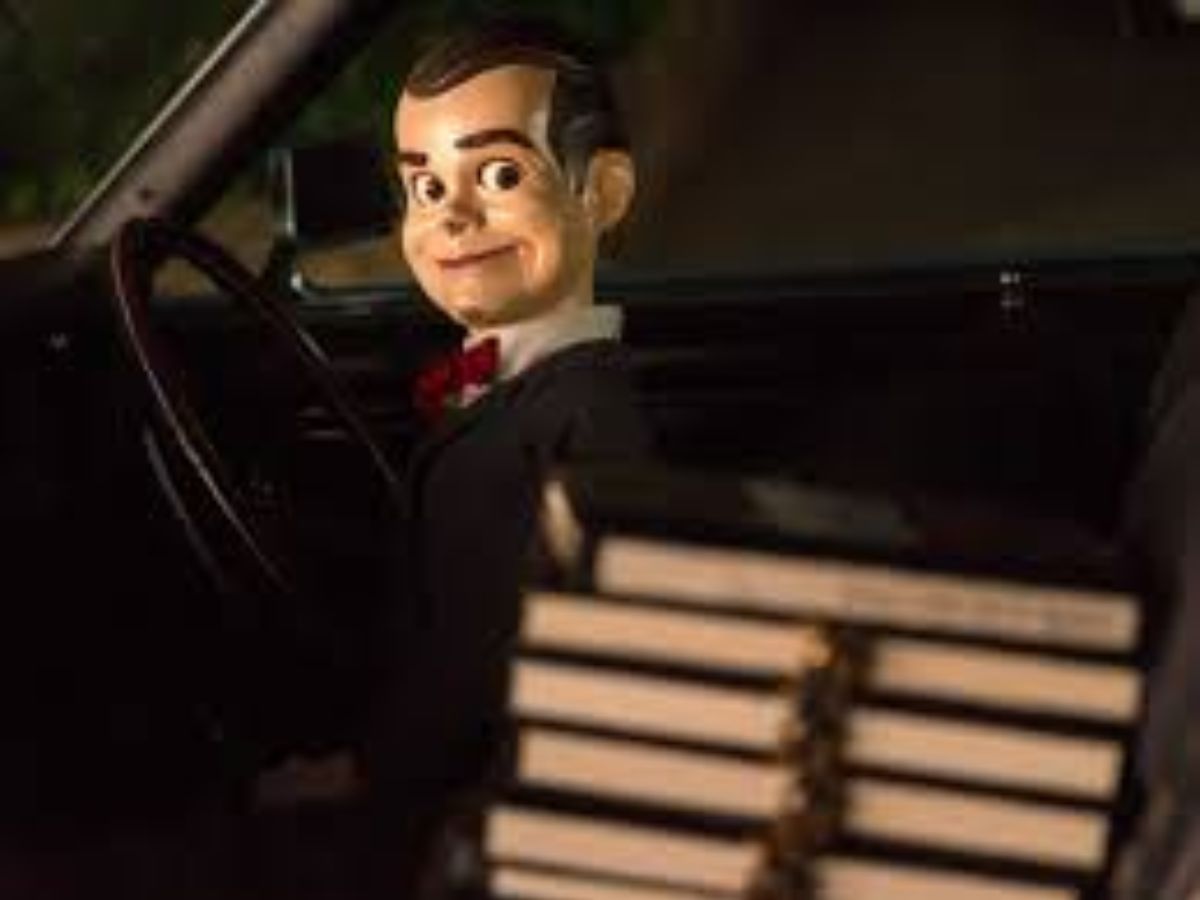 The Grinning Man Doll