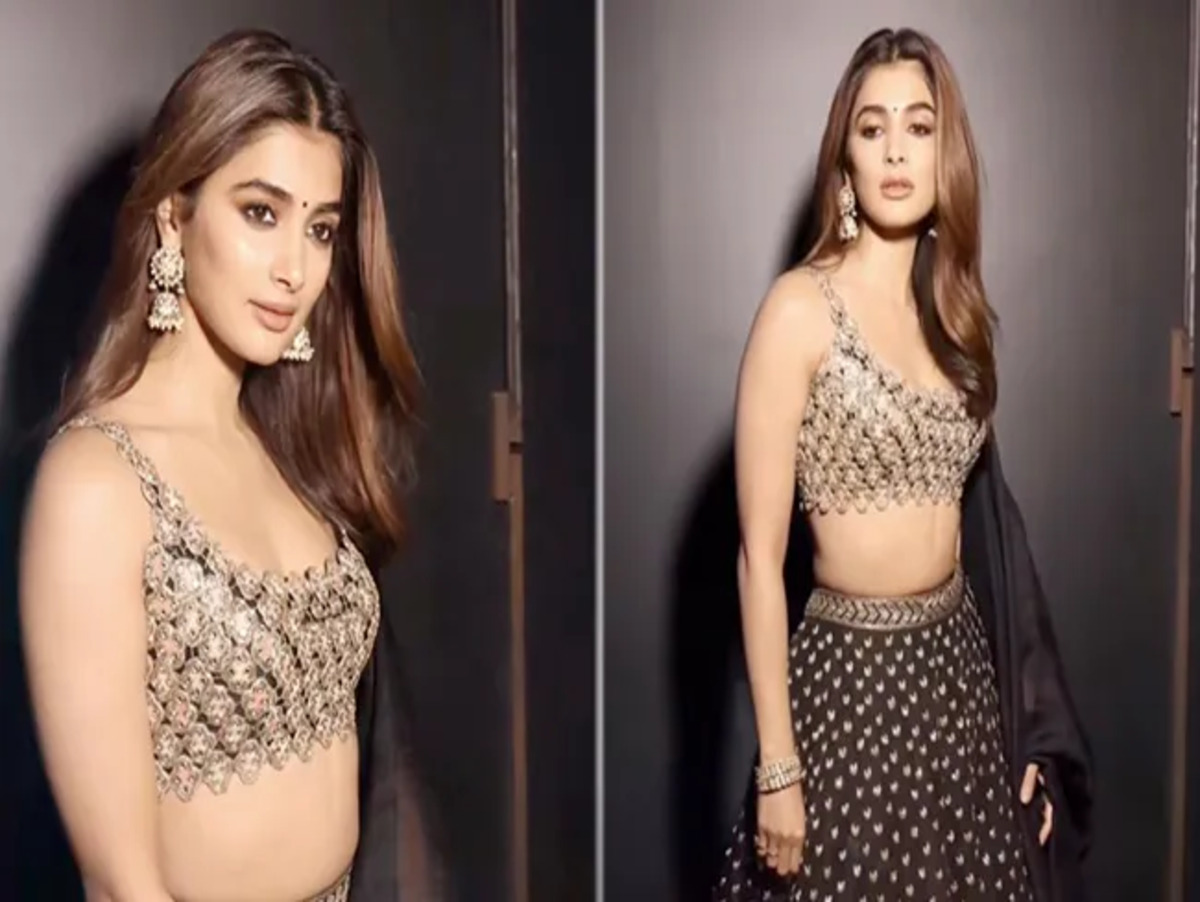 Pooja Hegde in a black and gold lehenga for Cirkus promotions.