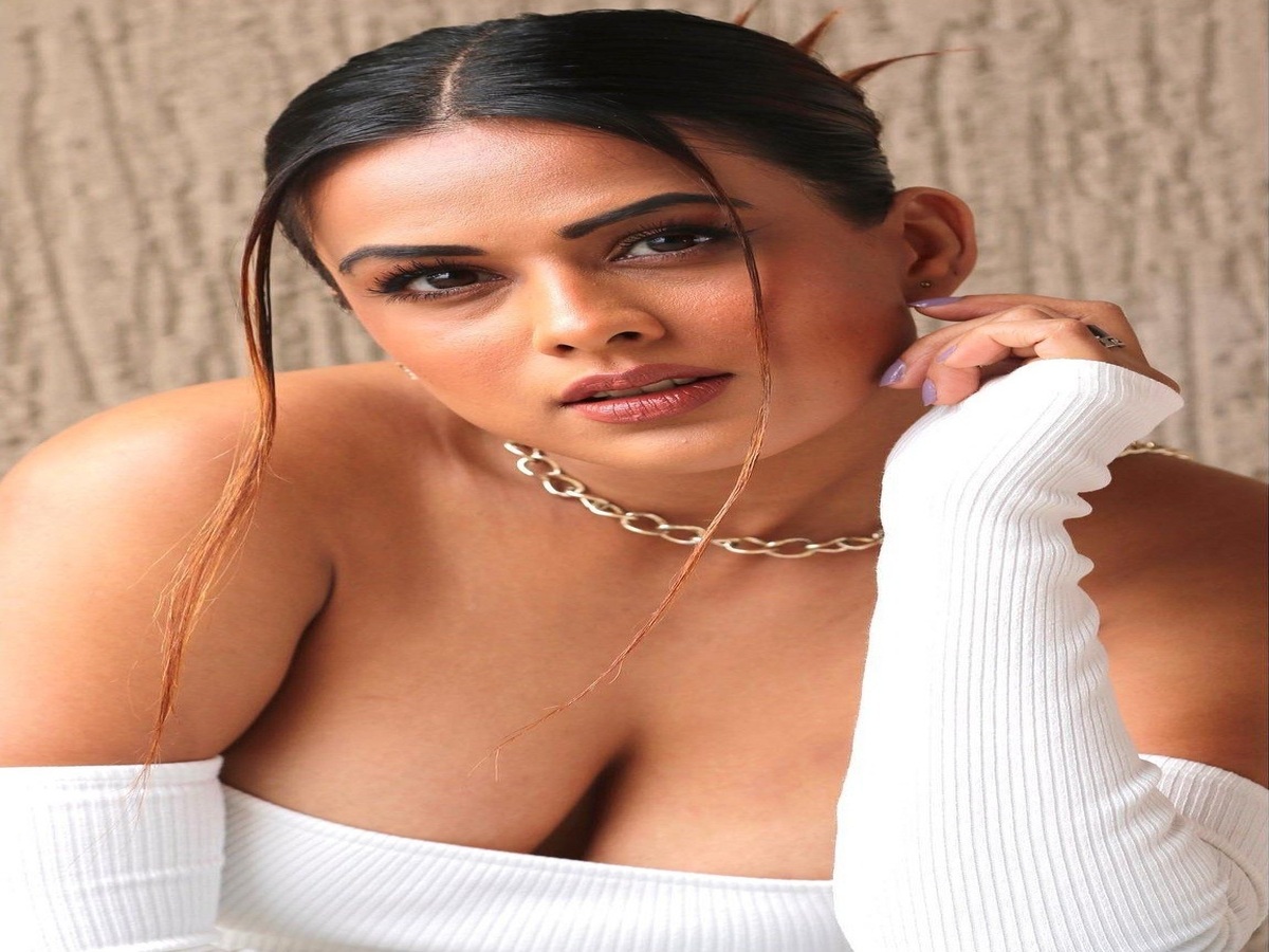 Nia Sharma demonstrating her bold fashion sense in a distinctive outfit, radiating confidence and personality.