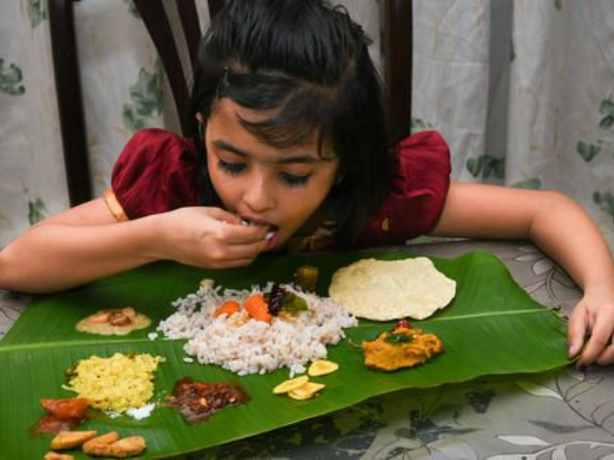 Child Learning To Eat With Hands