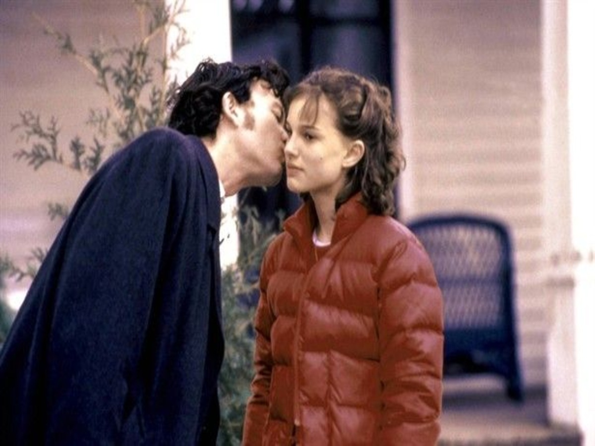 Timothy Hutton kissing Natalie Portman on the cheek in "Beautiful Girls," capturing a spontaneous and genuine moment that enhances the emotional connection between their characters.