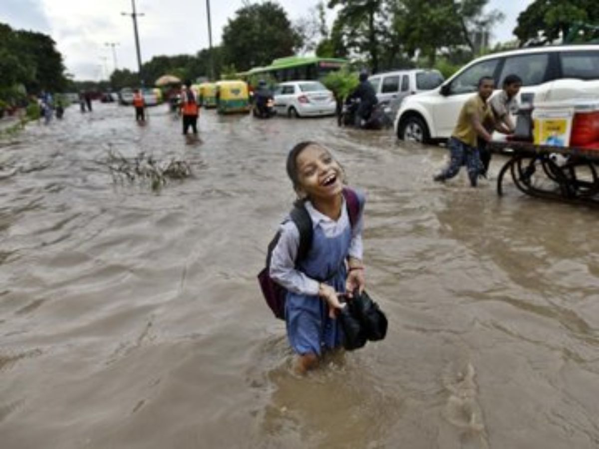 Monsoon Joy: A Schoolgirl’s Delight in the Rain