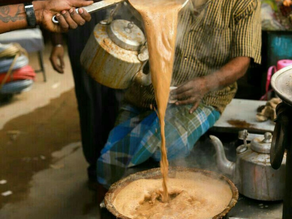 Clay cups filled with hot tea at a roadside tea stall in Lucknow.