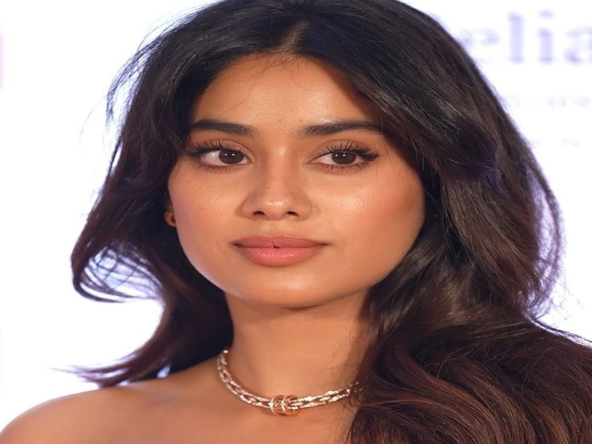 Janhvi Kapoor exuding elegance and confidence in a fashionable ensemble at a public event.