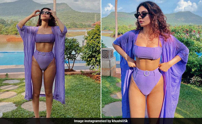 Khushi in a textured lilac bikini with a chic belt