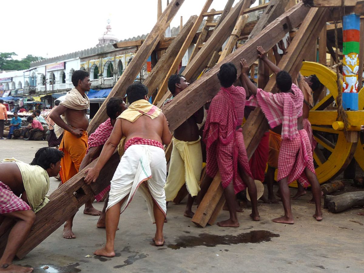 The collaborative effort involving hundreds of skilled artisans, servitors, and workers.