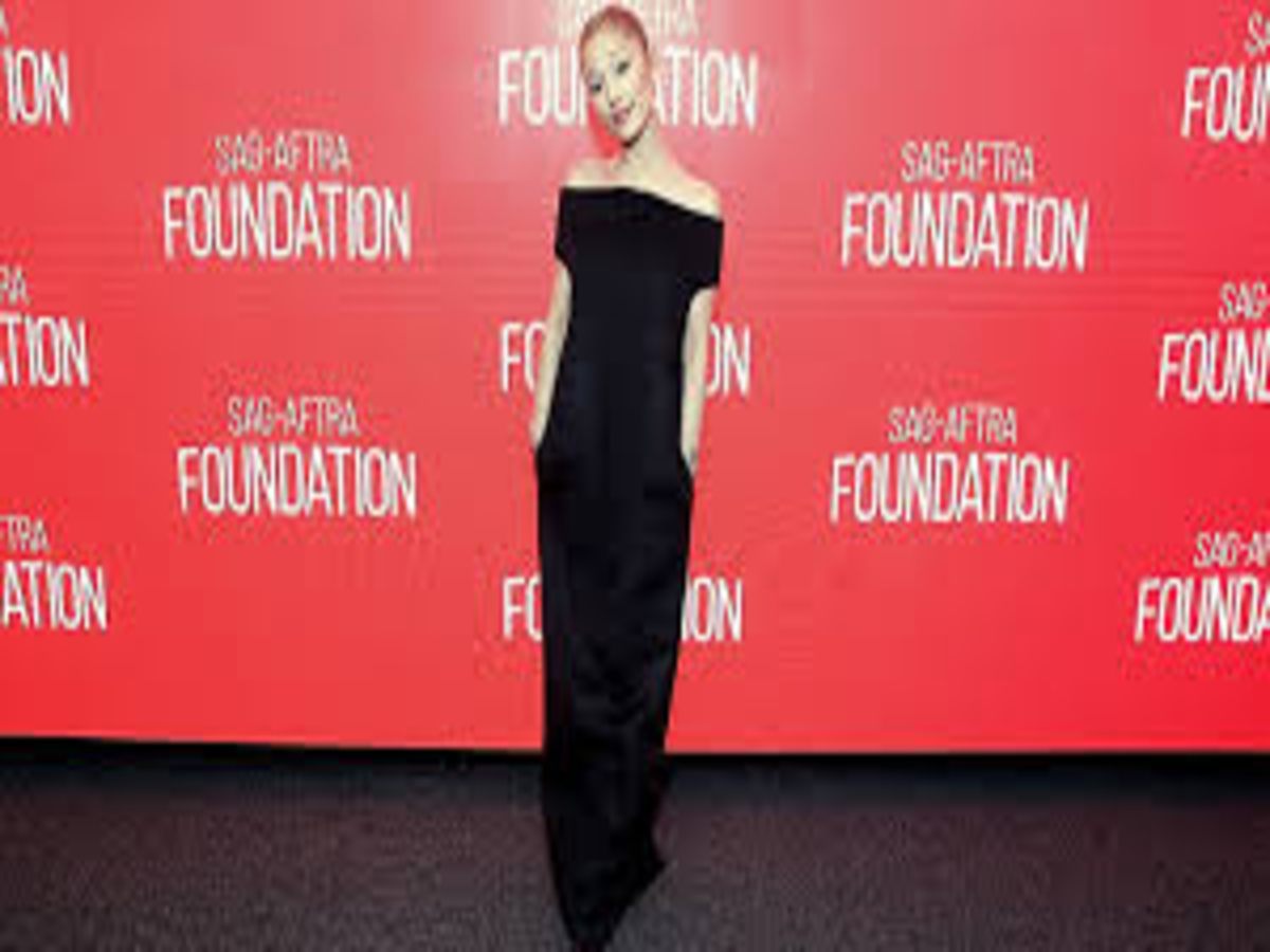 Ariana Grande in an all-black fuzzy dress at the SAG-AFTRA Foundation event.