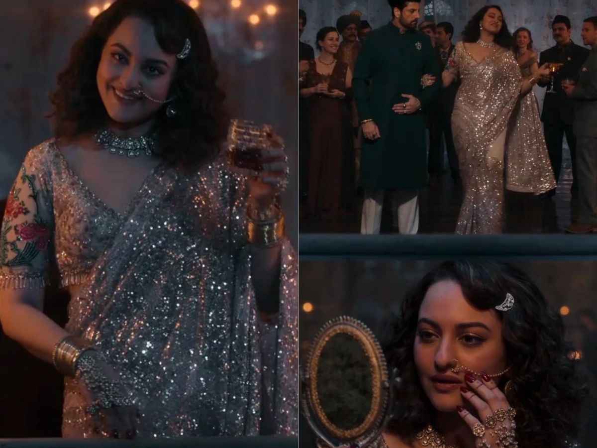 Sonakshi Sinha as Waheeda from Heeramandi, wearing a sparkling silver sequined saree with a low neckline, paired with a large choker necklace and a nose ring. She is seen smiling and holding a drink.