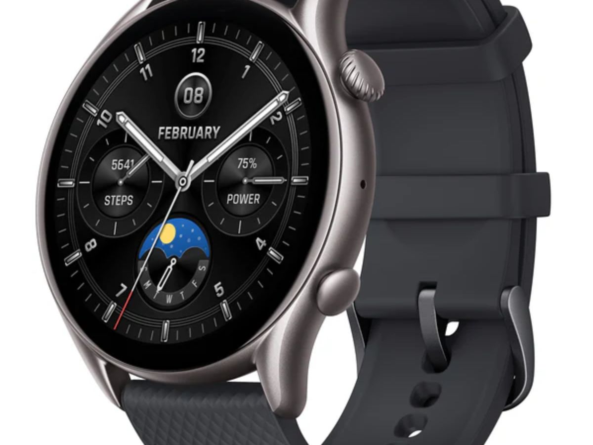 A close up of a silver-cased smartwatch with a black strap, displaying a watch face with digital readouts for steps, power, and the date (February 08), highlighting its fitness and smart features