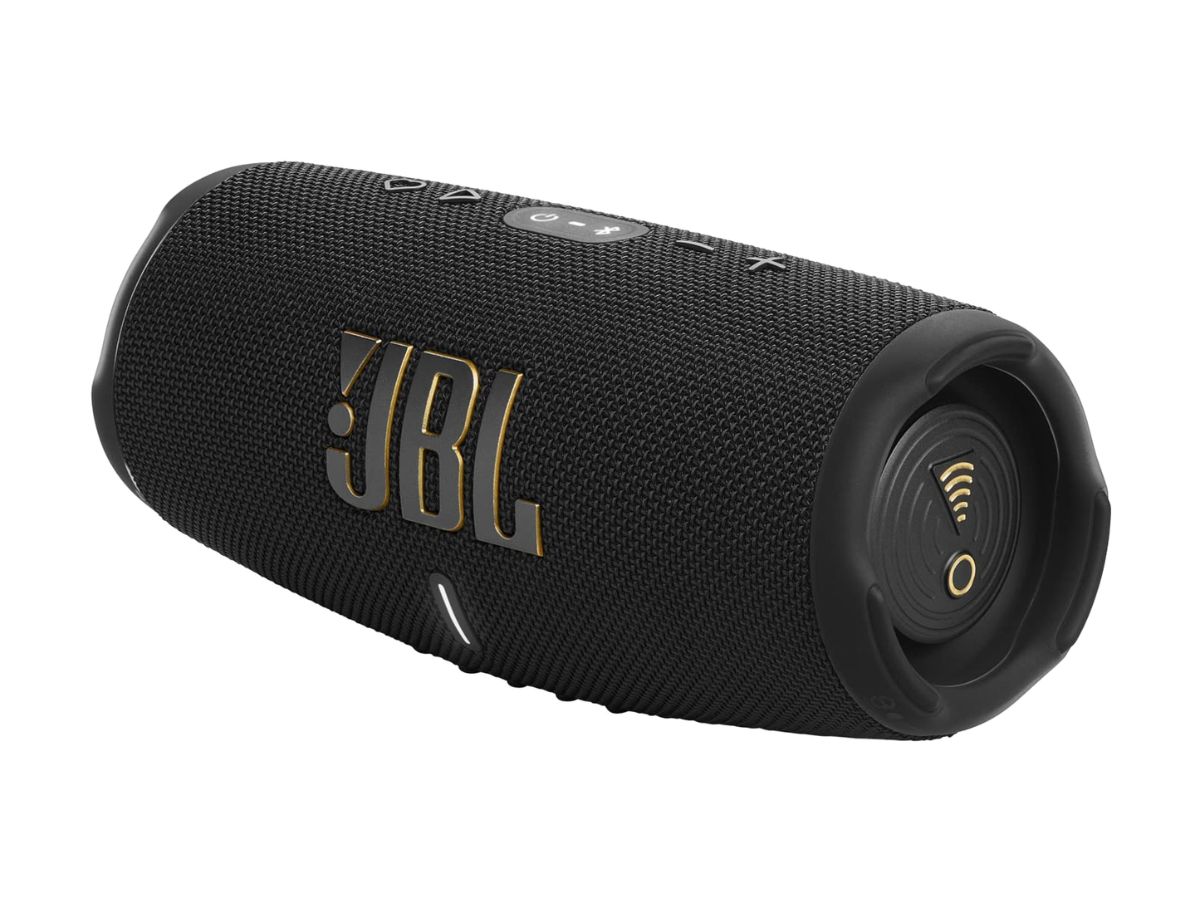 A black JBL portable Bluetooth speaker, cylindrical in shape, with the 'JBL' logo prominently displayed and controls visible on the top surface, suggesting a durable and audio-focused device.