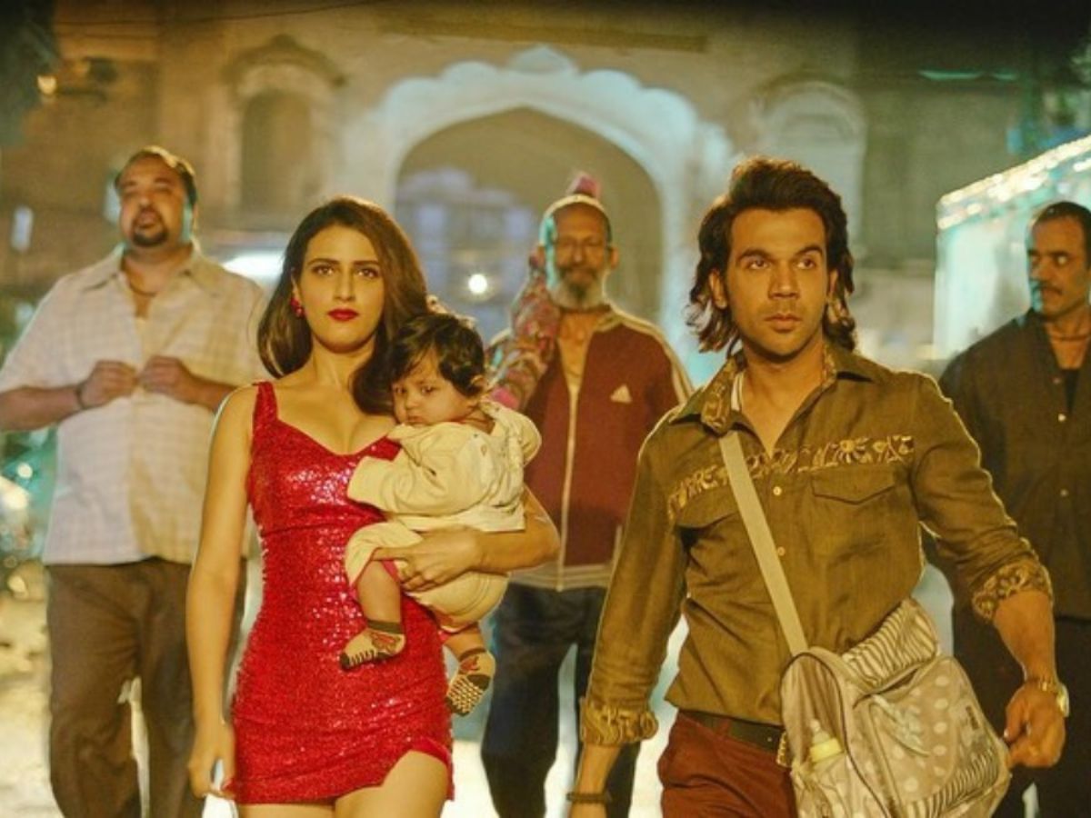 Rajkummar Rao and Fatima Sana Shaikh in Ludo, walking through chaos with a child in hand — where fate, crime, and emotion collide