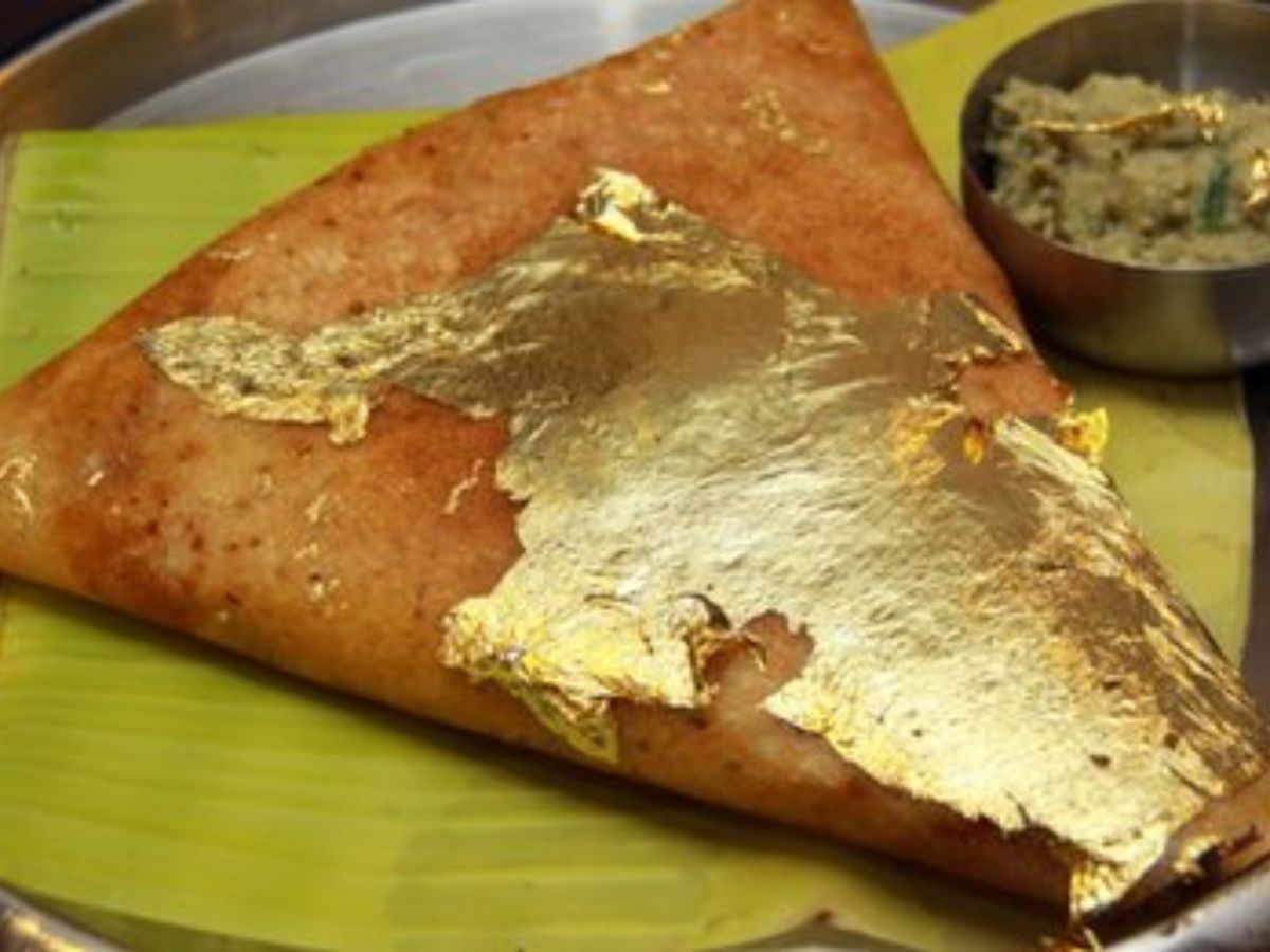 24K gold foil dosa served on silver plate at Raj Bhog Bangalore