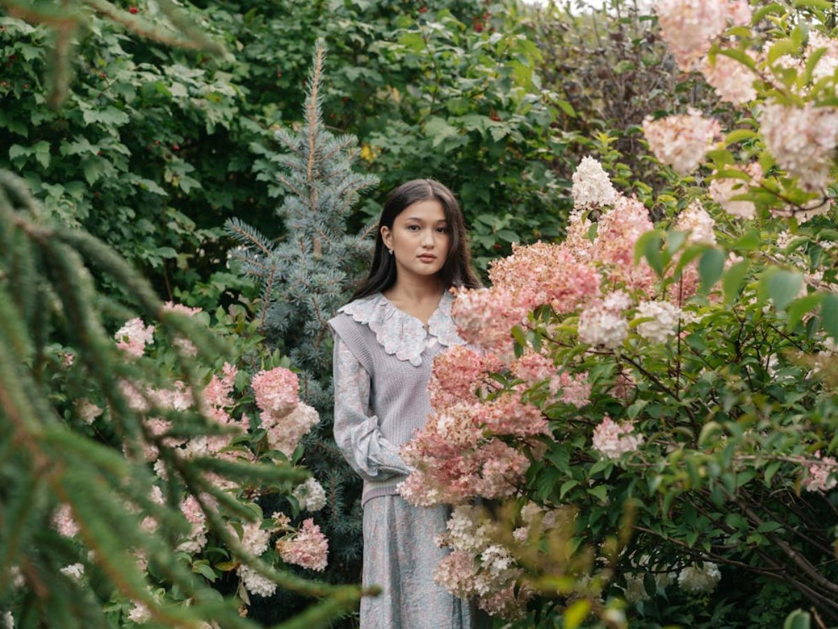 Woman in a dramatic floral Gucci dress