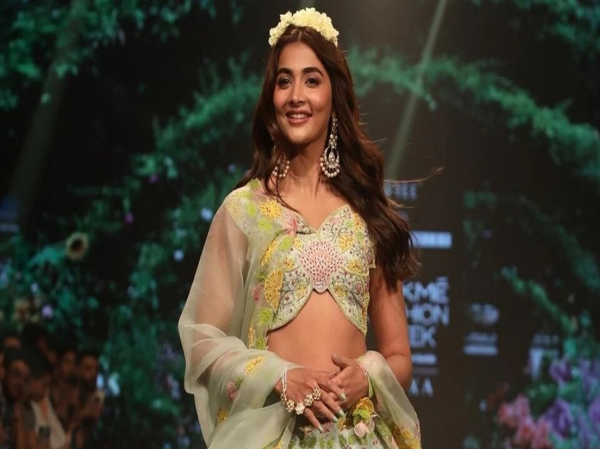 Pooja Hegde in a pastel green lehenga.