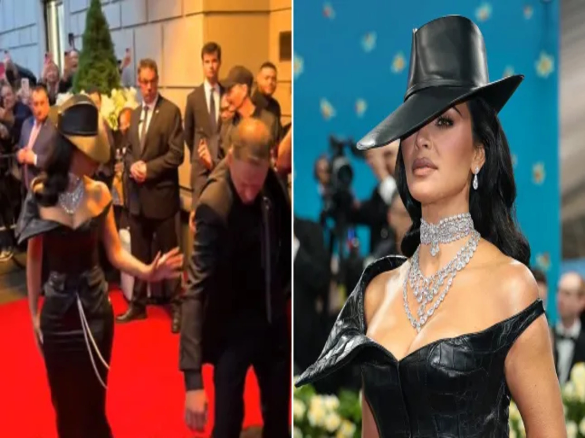 Kim Kardashian's dress train being stepped on by a security guard at the Met Gala