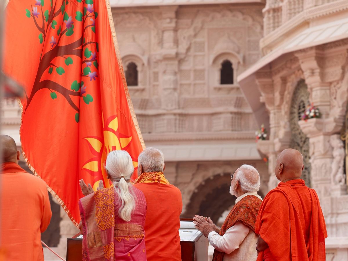 Flag Features Sun, Om, and Kovidara Tree