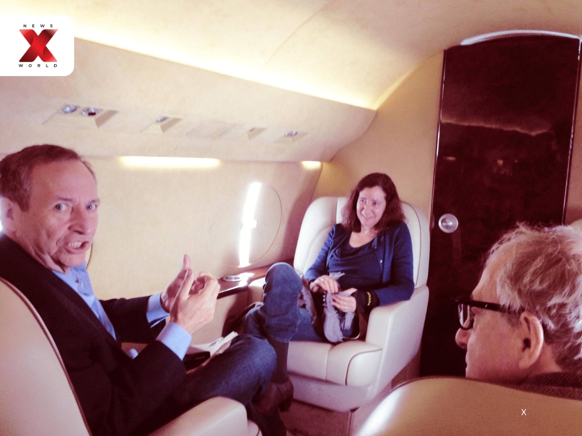Former Harvard president Larry Summers is pictured with his wife and filmmaker Woody Allen