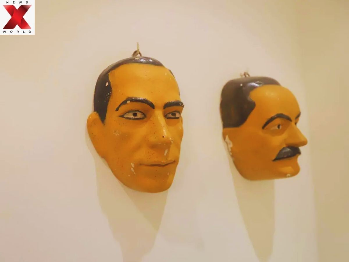 A room with masks displayed on the wall