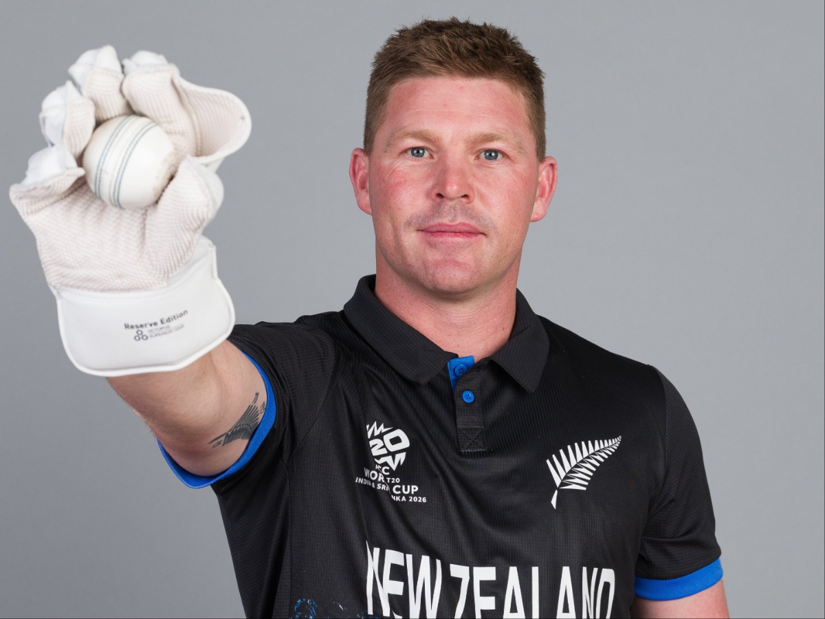 New Zealand cricketer Tim Seifert playing a powerful sweep shot in the black T20 kit, Tim Seifert in full wicketkeeping gear crouched behind the stumps, Tim Seifert celebrating a half-century with raised bat and helmet, professional headshot of Tim Seifert