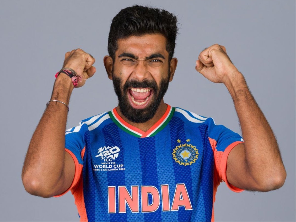 Jasprit Bumrah delivering a trademark yorker with his unique hyper-extended bowling action in the India blue T20 kit, close-up of Jasprit Bumrah celebrating his 500th international wicket with a modest smile and raised arms, Jasprit Bumrah mid-stride in the new 2026 Mumbai Indians blue and gold jersey
