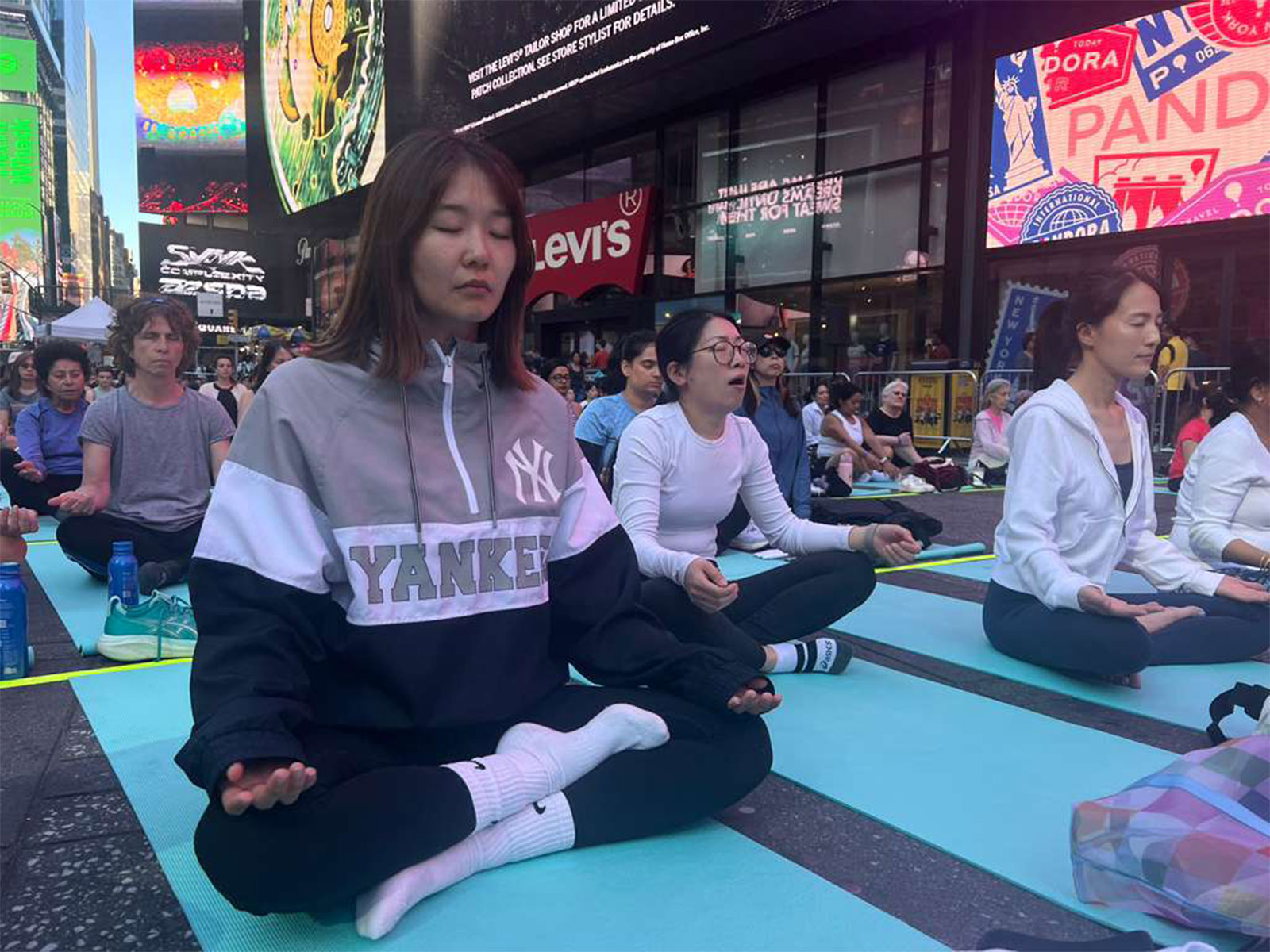 us-om-chants-echo-across-times-square-in-new-york-on-international-yoga-day20260621193001 US: Om chants echo across Times Square in New York on International Yoga Day