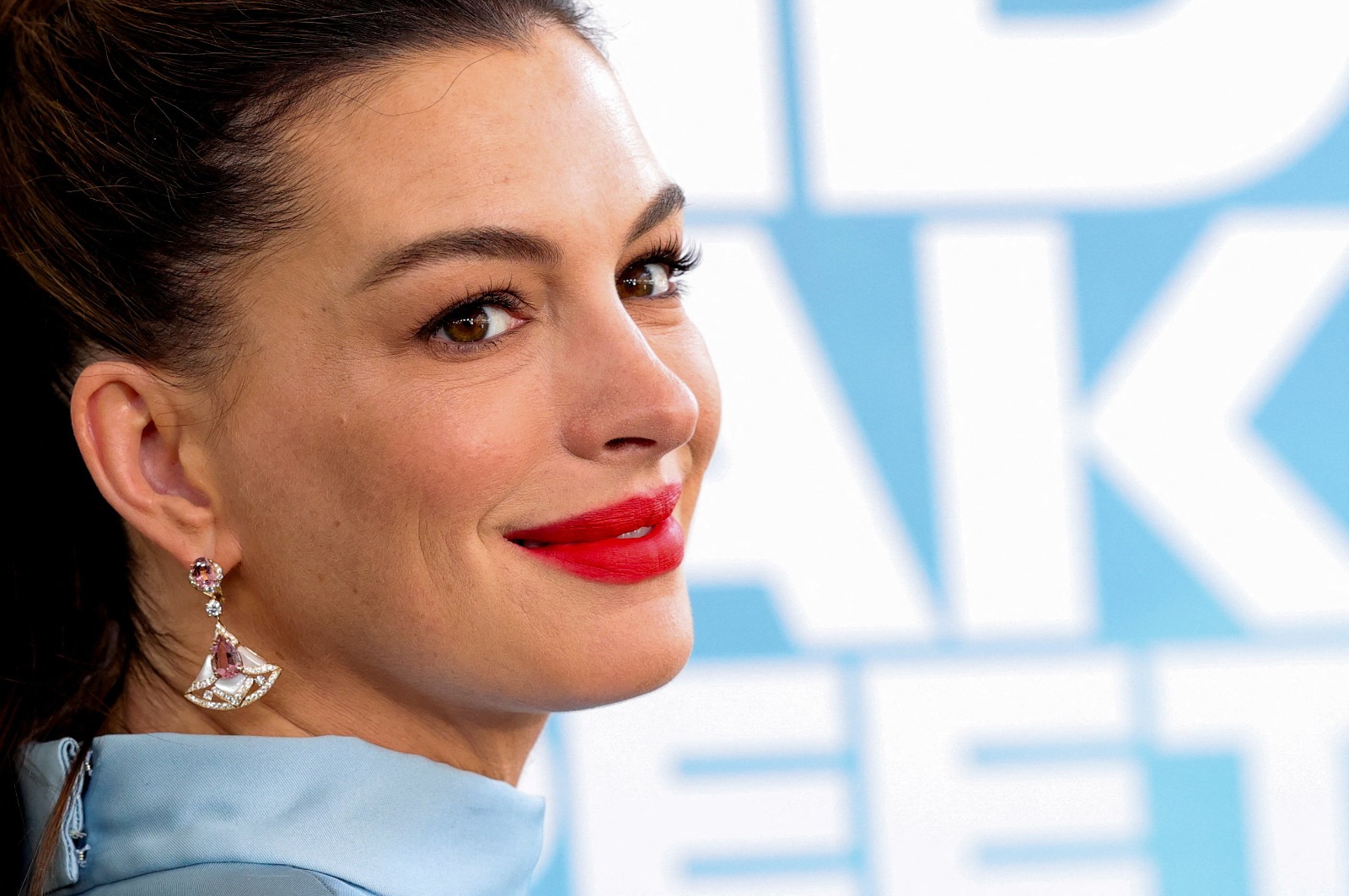 Anne Hathaway looks beautiful as she flaunts her baby bump at LA premiere of 'The End of Oak Street'